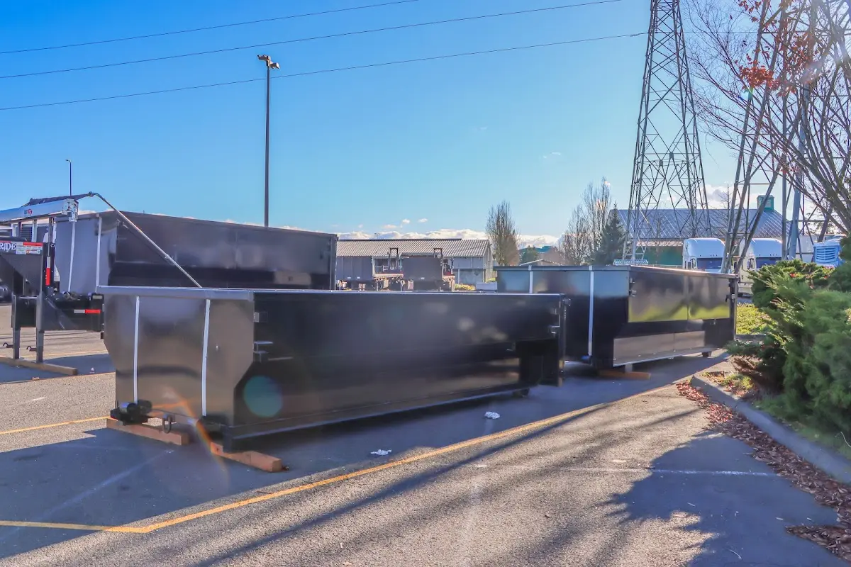 Roll-off dumpster ready for waste disposal at job site for 2 Yard Dumpster Rental in Freetown